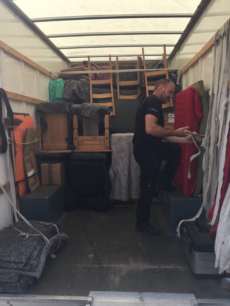 Strapping a load inside a removal van