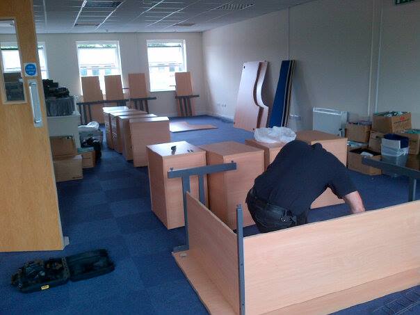 man assembling office furniture