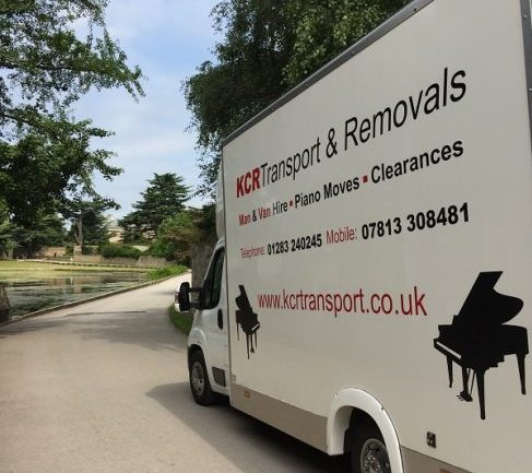 The side of a KCR Transport and Removals van